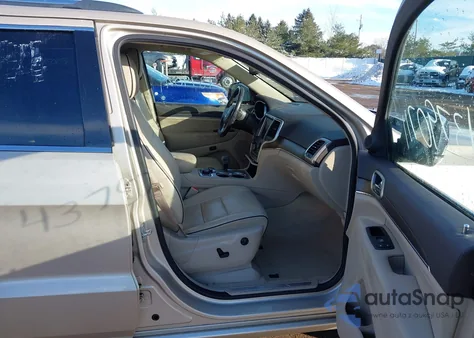 2014 Jeep Grand Cherokee Overland z USA, uszkodzony, nr VIN 1C4RJFCG6EC441928